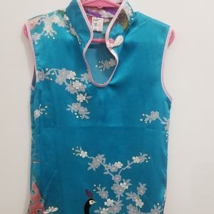 Turquoise dress with peacock